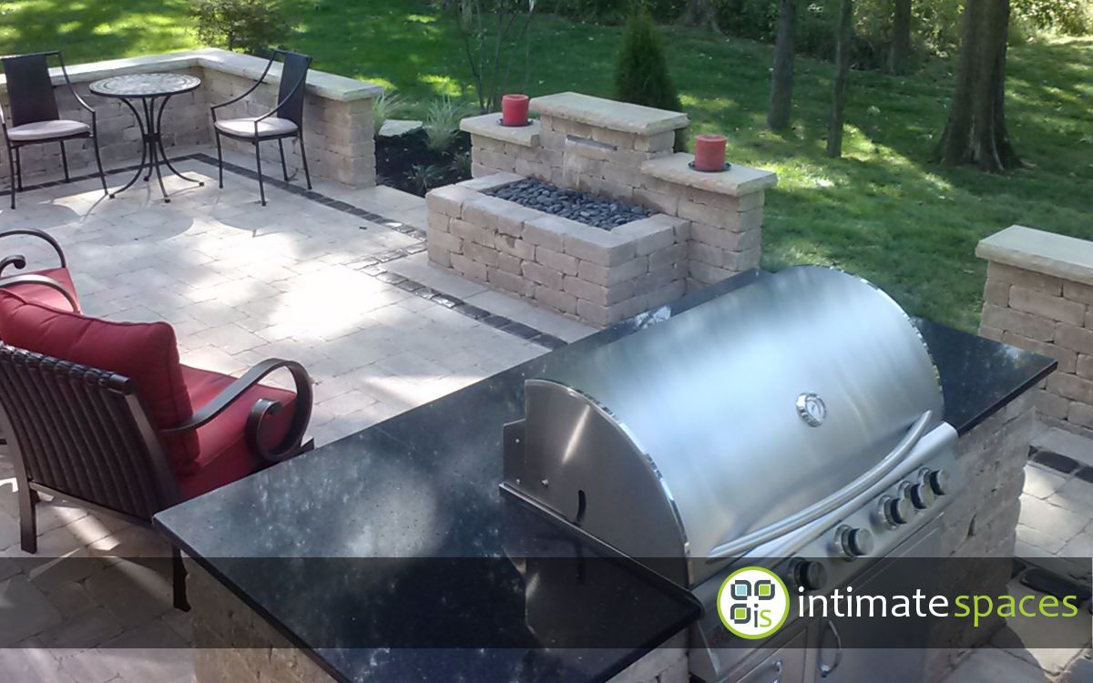 New Albany patio, water feature, grilling island, stone walls